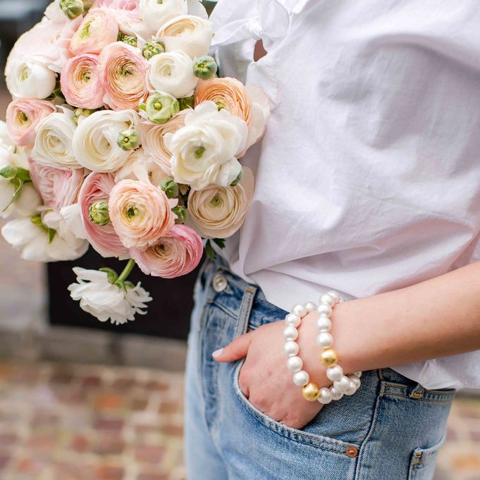 Model is wearing Olivia Cotton Pearl & Gold Bracelets_m donohue collection