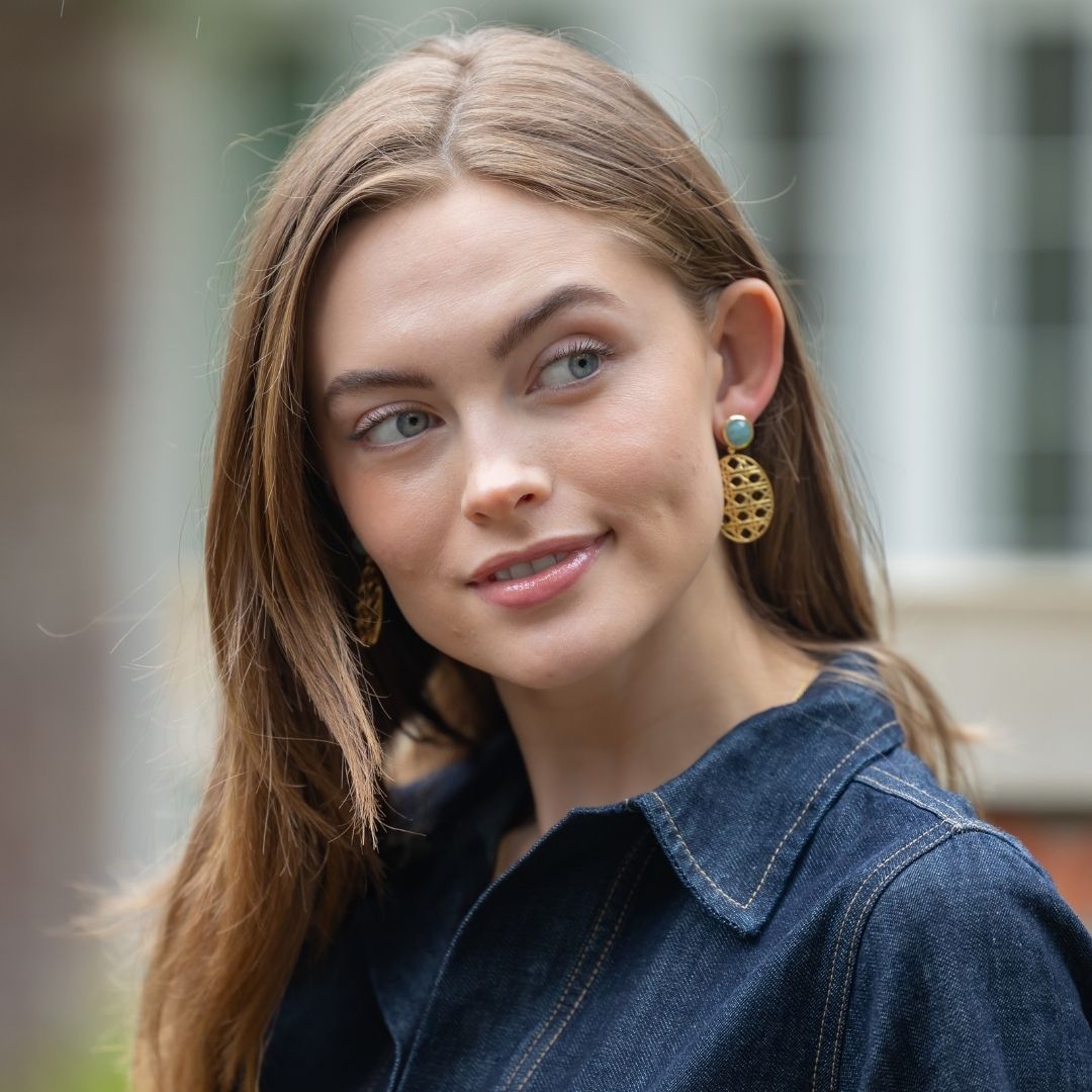 Model is wearing Remy Wicker Gold Oval & Aquamarine Earrings_m donohue collection