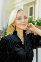 Model wearing Emerald Gemstone Triple Drop Earrings_M Donohue Collection