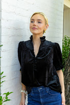 Model wearing Cecile Moss Peridot Flower Drop Earrings_M Donohue Collection