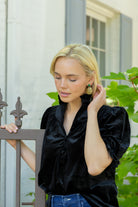 Model wearing Remy Emerald Wicker Drop Earrings_M Donohue Collection