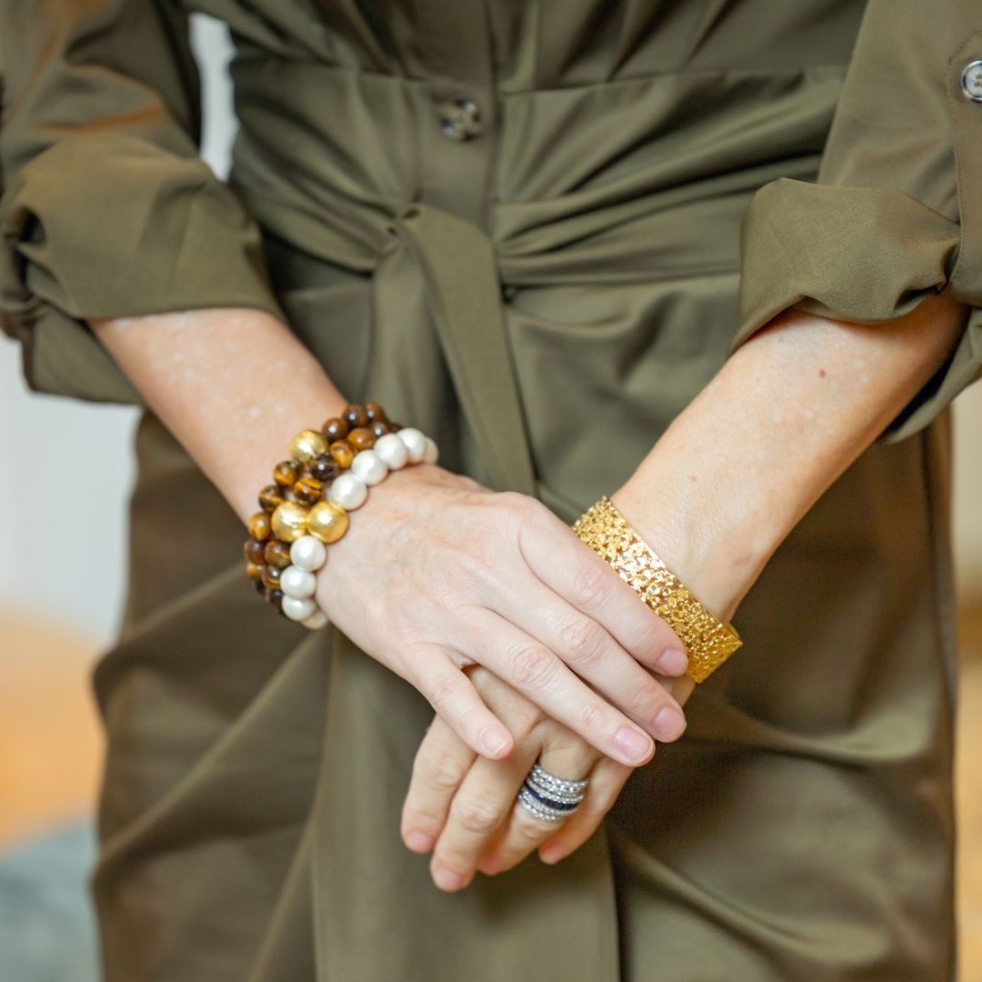 Model is wearing Lauren Tiger Eye Bracelet with Jardin Gold bangle Bracelet_m donohue collection