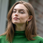 Model is wearing Maison Treillage Gold Hoop Earrings_m donohue collection