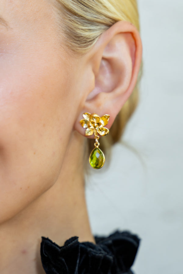 Model wearing Magnolia Flower Moss Peridot Drop Earrings_M Donohue Collection