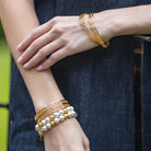 Model is wearing Olivia Cotton Pearl & Multi Gold Bracelet_m donohue collection