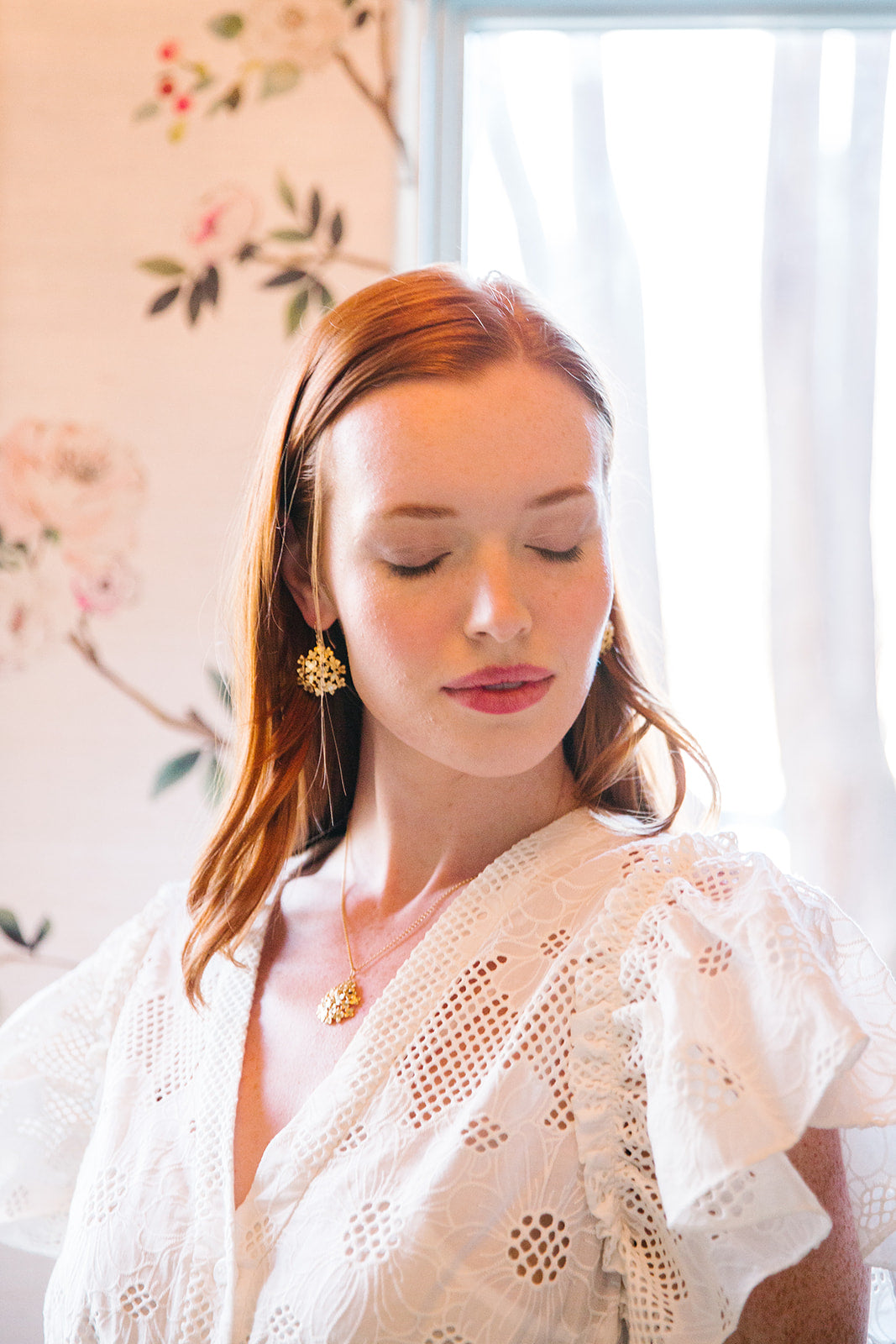 Model is wearing the Jardin Hydrangea Gold Hook earrings_m donohue collection