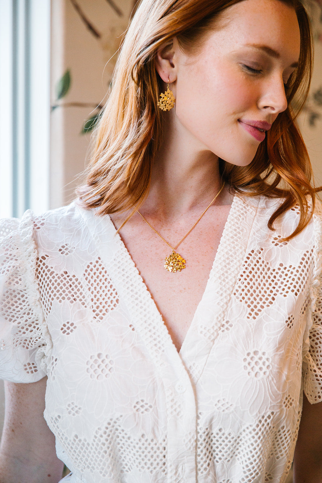 Model wear the Jardin Hydrangea Gold Pendant necklace_m donohue collection