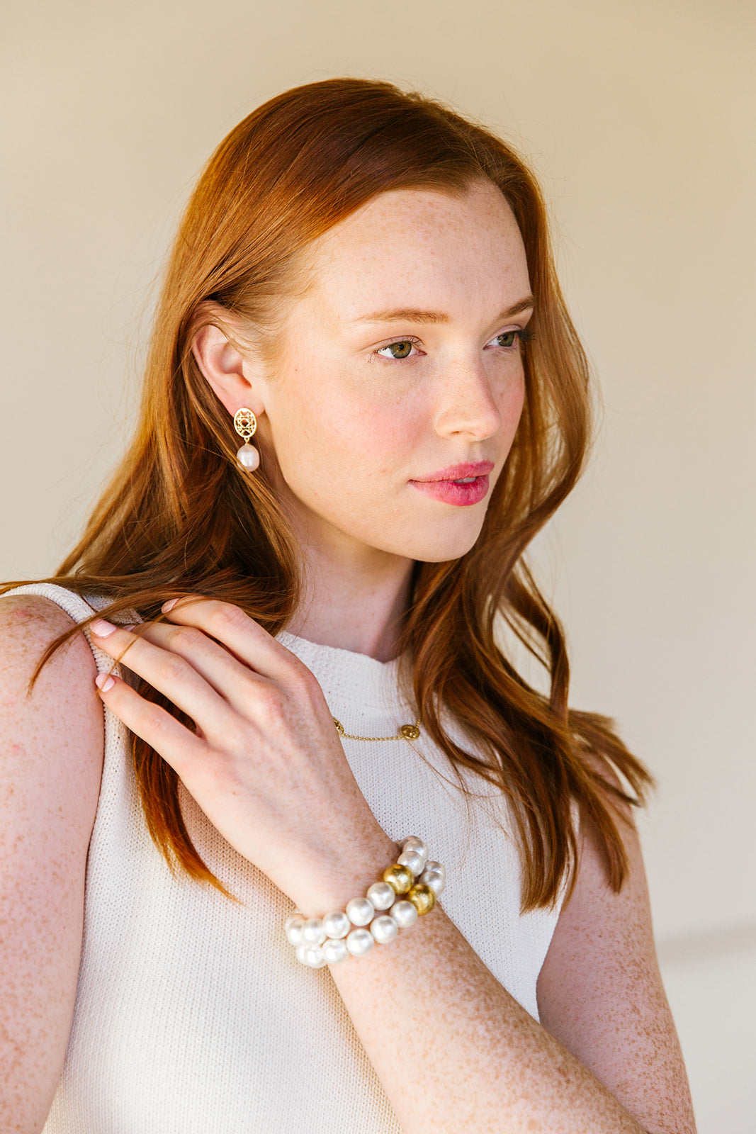 Model is wearing Remy Pearl Earrings_m donohue collection